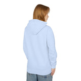 Teen wearing light blue hoodie and jeans, streetwear fashion from TeenHub