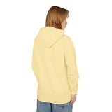 Teen wearing pastel yellow hoodie and denim jeans, streetwear fashion by TeenHub