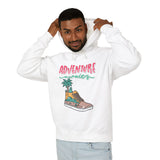 Young man in white Adventure Awaits hoodie, trendy streetwear from TeenHub, youth fashion